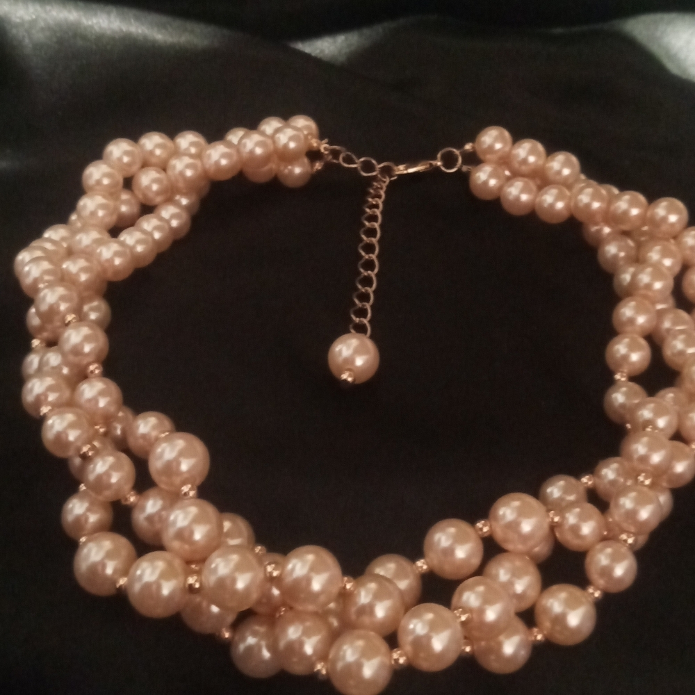 Pink pearl faux Layered 16 in. extendable to 20.